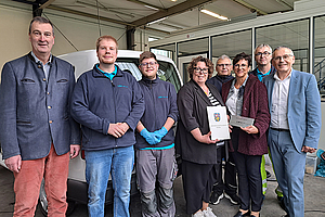 Gruppenfoto von der Übergabe des Bewilligungsbescheids