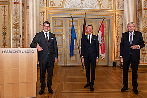Gruppenfoto mit den drei Rednern
